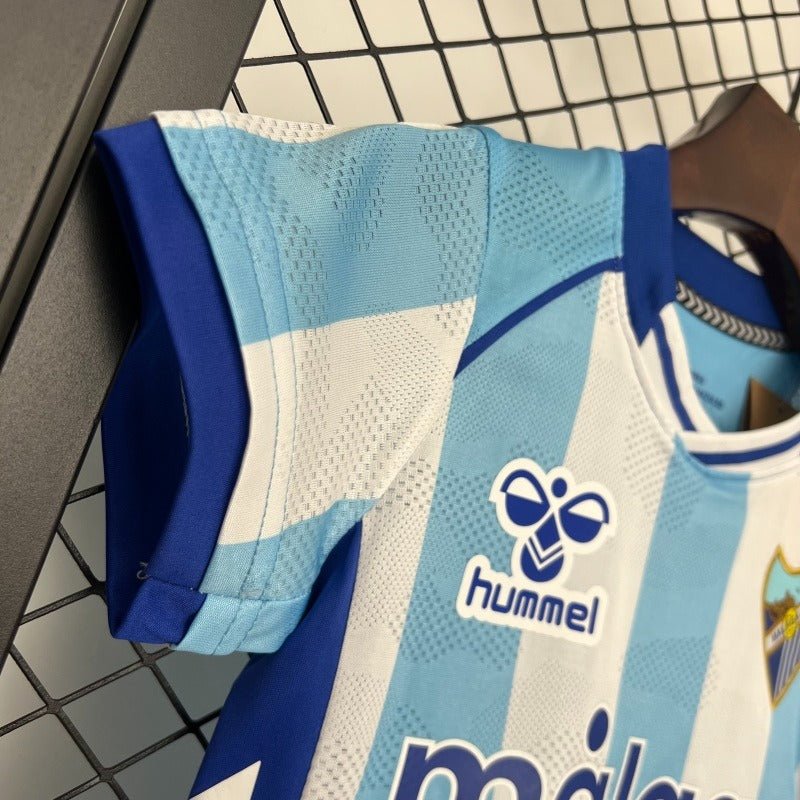 Kids M¨¢laga CF 2025 - 2026 home - WCFOOTBALLSUIT